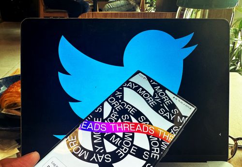 Illustration of Threads and Twitter  