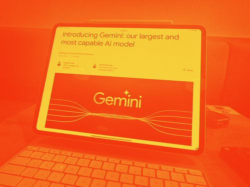 Google Gemini announcement article on a screen.